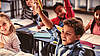 A primary school class enjoys the lesson